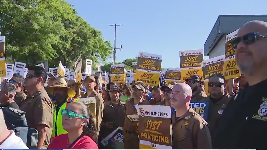 UPS workers hold rally as strike deadline approaches