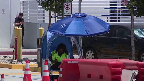 Workers fighting triple-digit temps