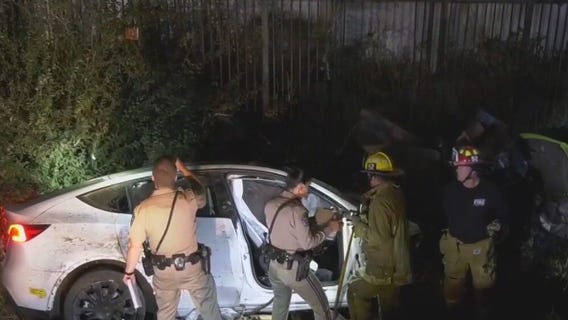 Tesla flies off 10 Freeway in Los Angeles, crashes into homeless encampment below