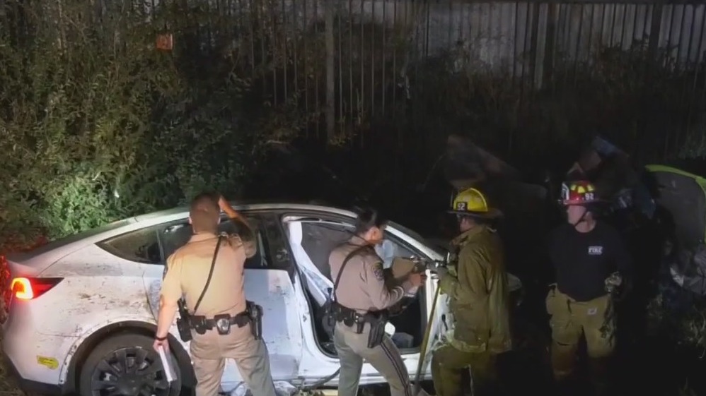 Tesla flies off 10 Freeway in Los Angeles, crashes into homeless encampment below