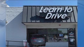Driver crashes into driving school