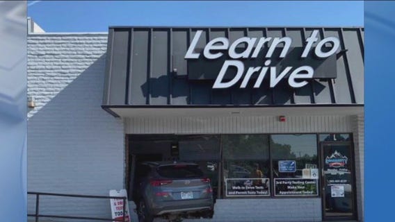Driver crashes into driving school