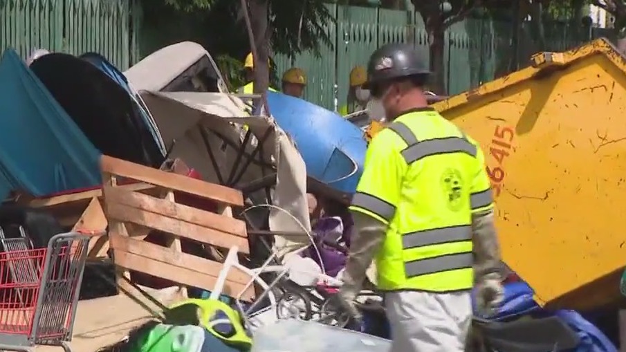 LA sanitation crews clean up Hollywood homeless encampment
