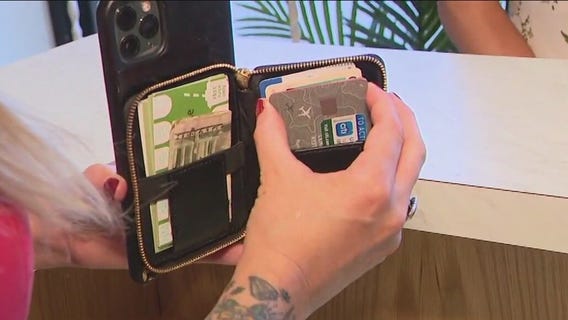 Cop accused of stealing debit card on the job