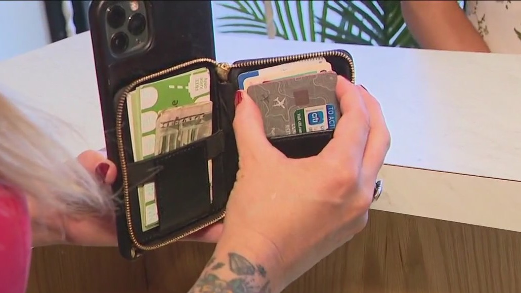 Cop accused of stealing debit card on the job