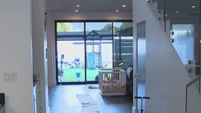 Nanny hides in bathroom with baby after masked men tried to break in