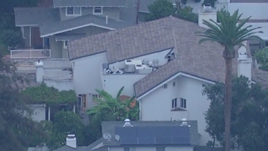 Bear possibly barricaded inside home