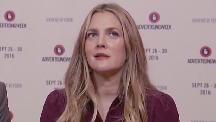 Drew Barrymore postpones show taping