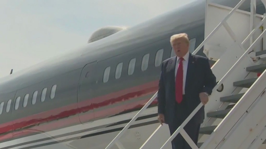 Trump skipping debate; Visits Michigan instead