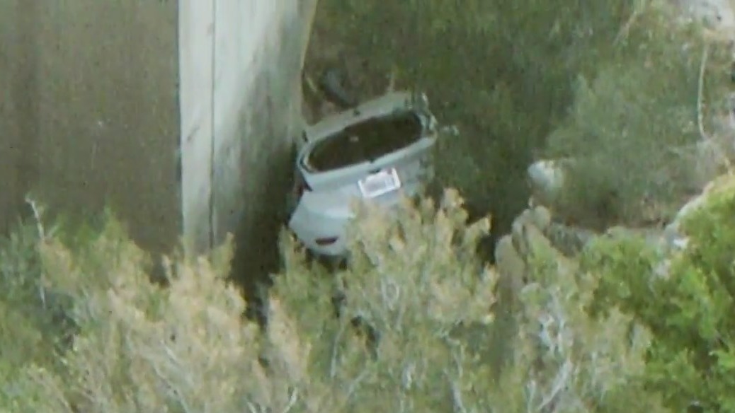 Car flies off bridge ? and driver survives