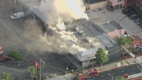 Crews battling strip mall fire in South Gate