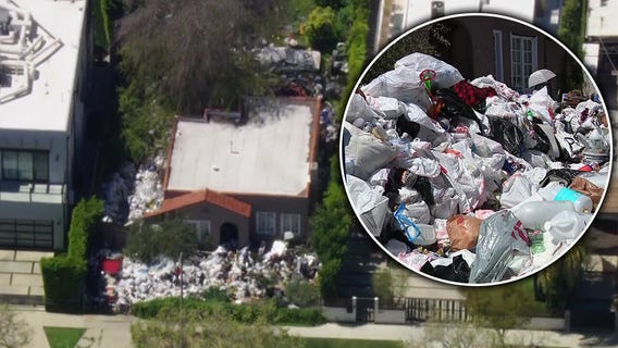 Trash fills yard of Fairfax District home