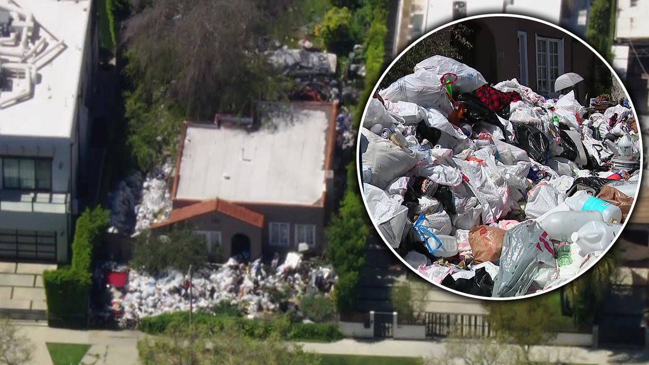 Trash fills yard of Fairfax District home