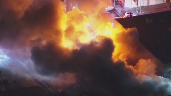 Massive fire erupts in downtown LA