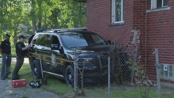 Wayne County Sheriff's Office SUV hits house during chase of armed suspects in Detroit