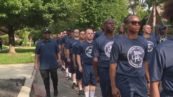 Officers 'bring community to policing' during Walk-A-Mile Wednesday
