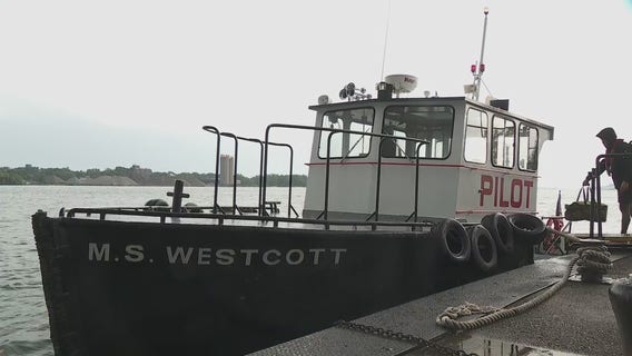 J.W. Westcott saves another man in the Detroit River