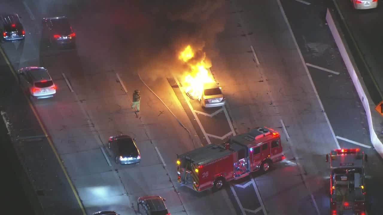 Car explodes on 10 Freeway near downtown LA | FOX 11 Los Angeles