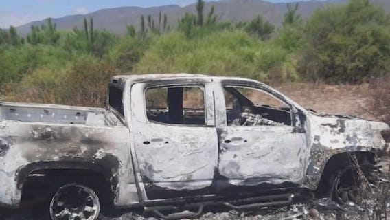 Parents ID bodies of murdered surfers