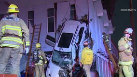 4 injured after car crashes into building