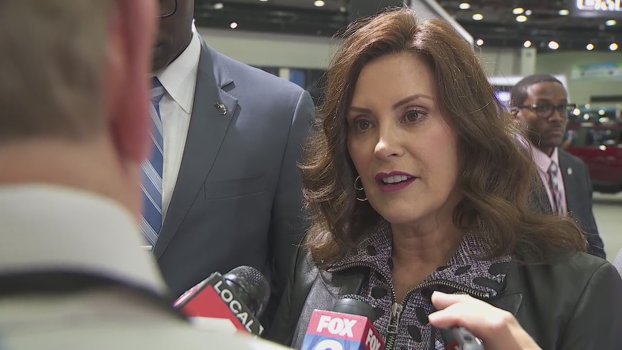 Whitmer tours Auto Show, comments on brewing strike