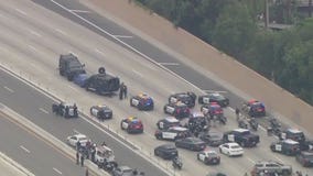Pursuit standoff shuts down 91 Freeway