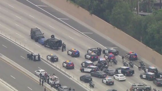 Pursuit standoff shuts down 91 Freeway