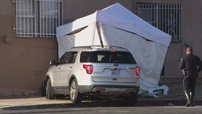 Husband sees wife die after car pins her