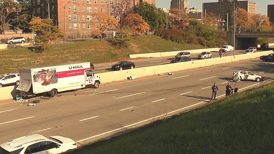 Crash between a disabled U-Haul truck and a car on the Lodge shuts down traffic.
