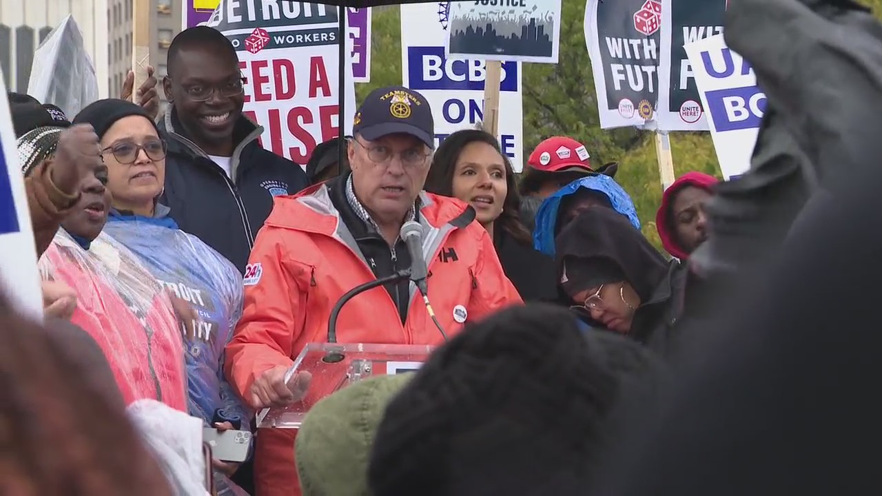 Striking workers march together from UAW, casinos and Blue Cross Blue Shield in Detroit