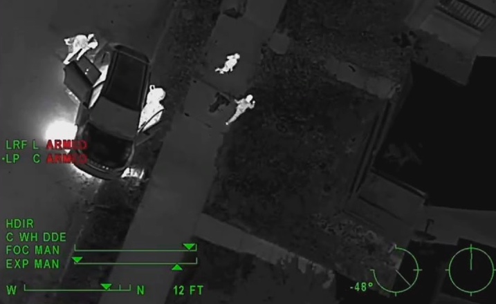 Adults run from Detroit police with four children in the car