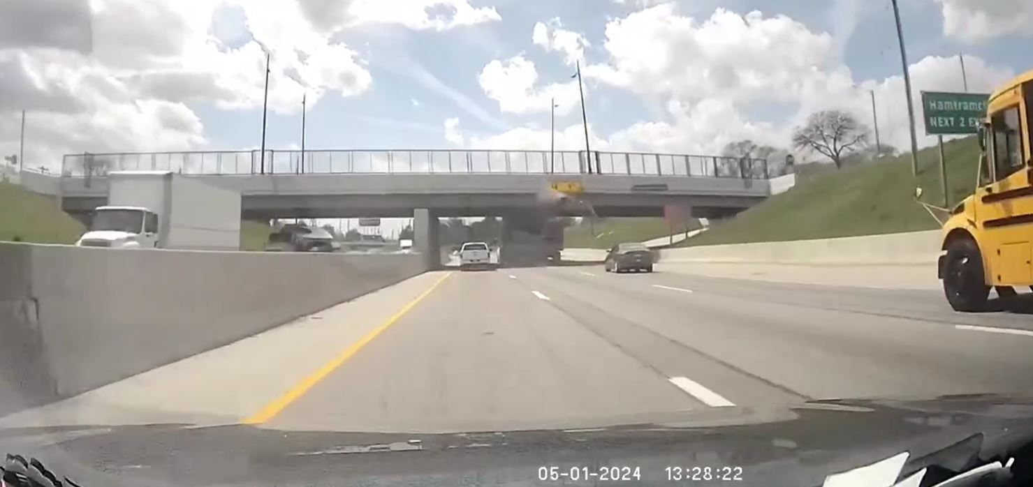 Video: Semi-truck hits bridge on I-94 near Van Dyke