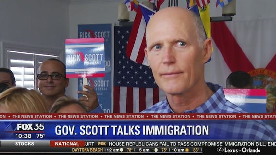 Gov. Scott talks immigration at summit
