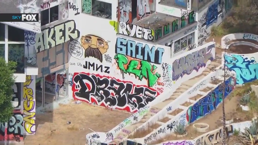 Squatters take over, graffiti Hollywood Hills mansion