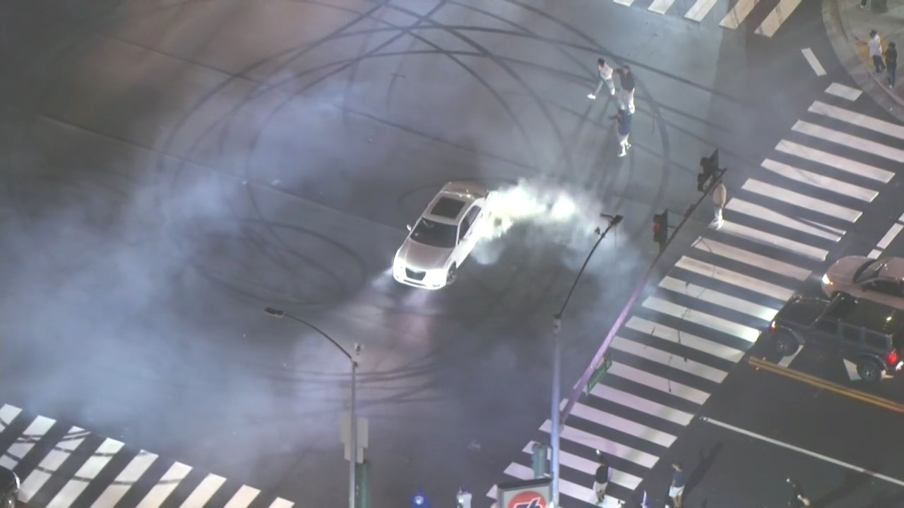 Car does donuts in East LA after Dodgers win