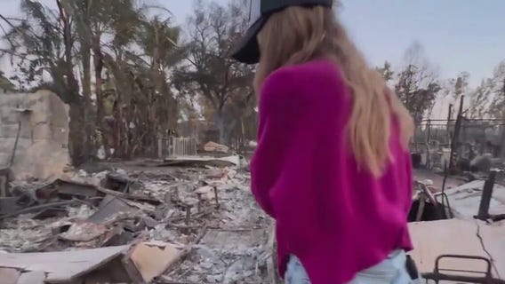 20,000-acre California fire destroys 130+ buildings