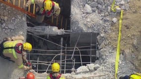 Woman stuck in confined space in Westlake