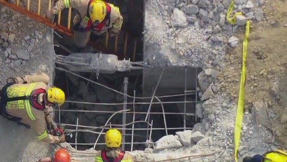 Woman stuck in confined space in Westlake