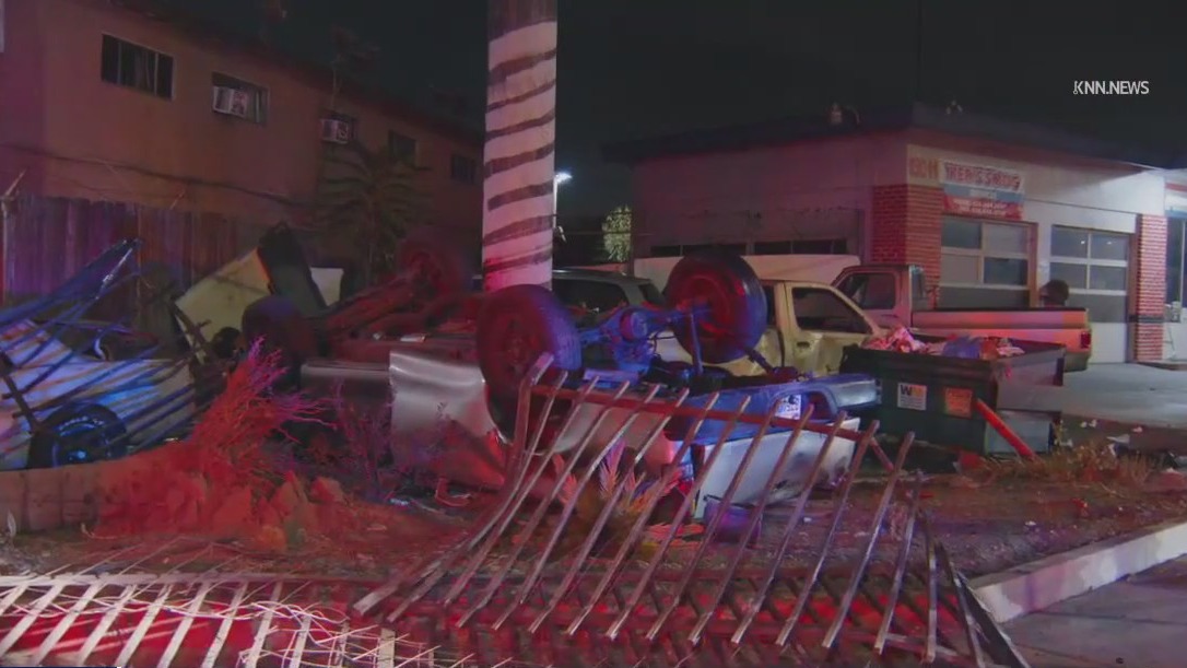Pursuit suspect crashes into auto repair shop