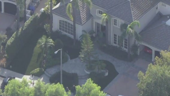 FBI at home linked to murdered Doctor's ex-wife