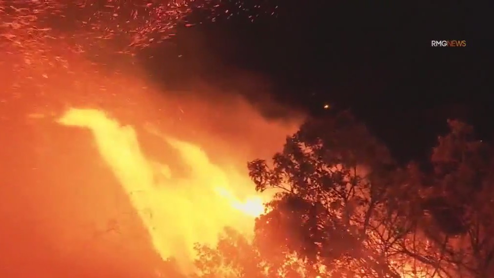 Firefighters race to save homes in Malibu