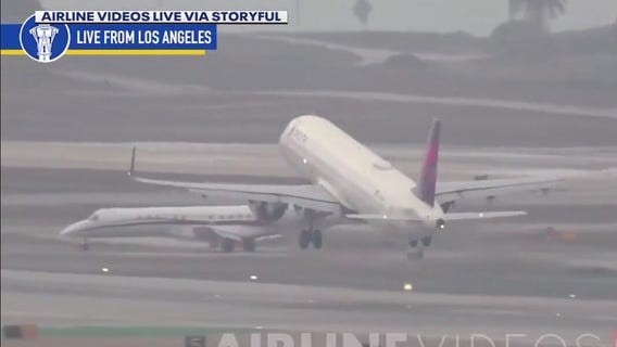Delta plane leaving LAX nearly hits another jet