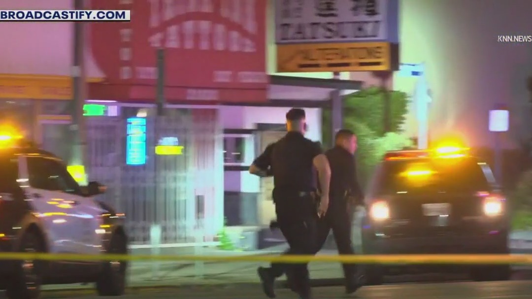 Armed man killed at Woodland Hills motel