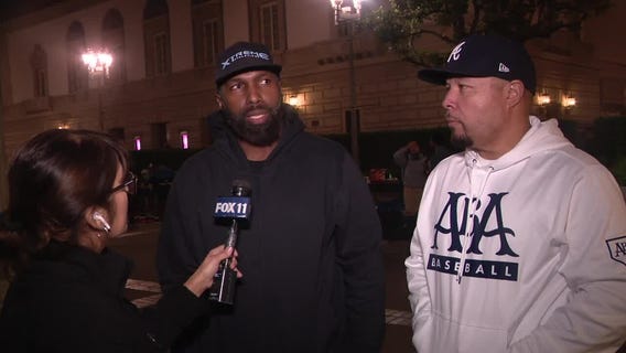 LA fire survivor finds sister's body in debris