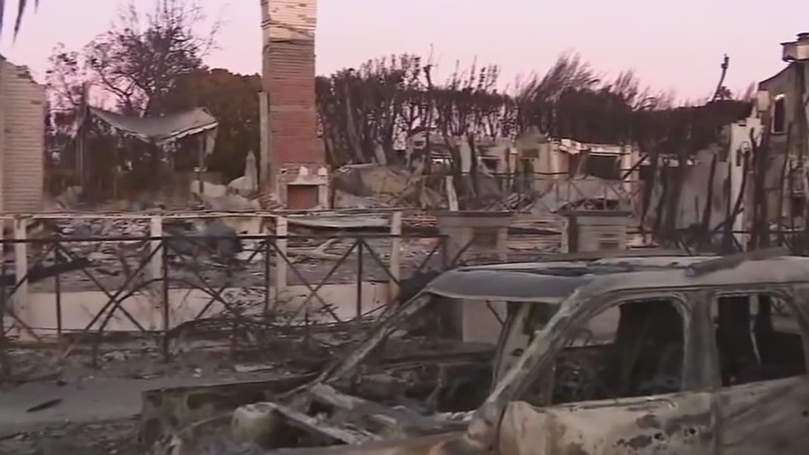 Firefighters race against the clock as high winds return