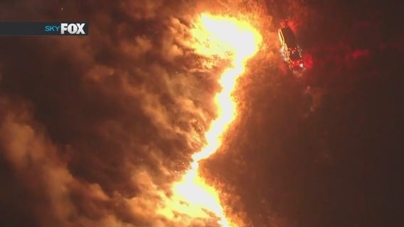 Wildfires burn across Southern California