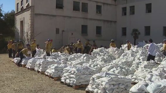 LA's fire zones prepare for incoming storm