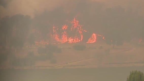 Hughes Fire spreads, students evacuate