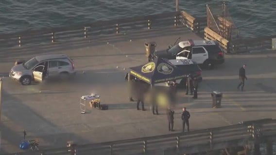 Murder suspect killed in police shooting on Newport Beach Pier