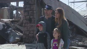 Family visits home burned in Palisades Fire